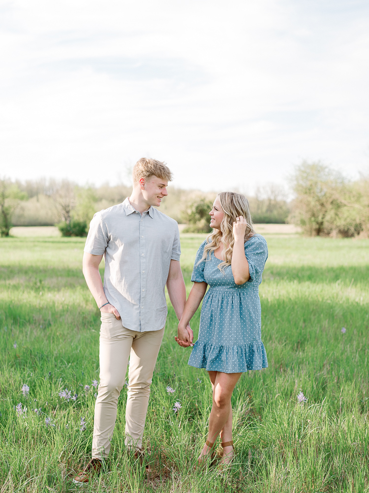 a couple in a field for an Oregon engagement session