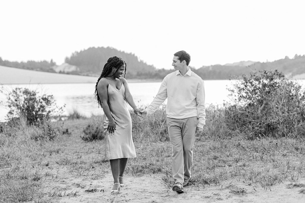 Oregon Engagement - Engaged couple smiling at each other