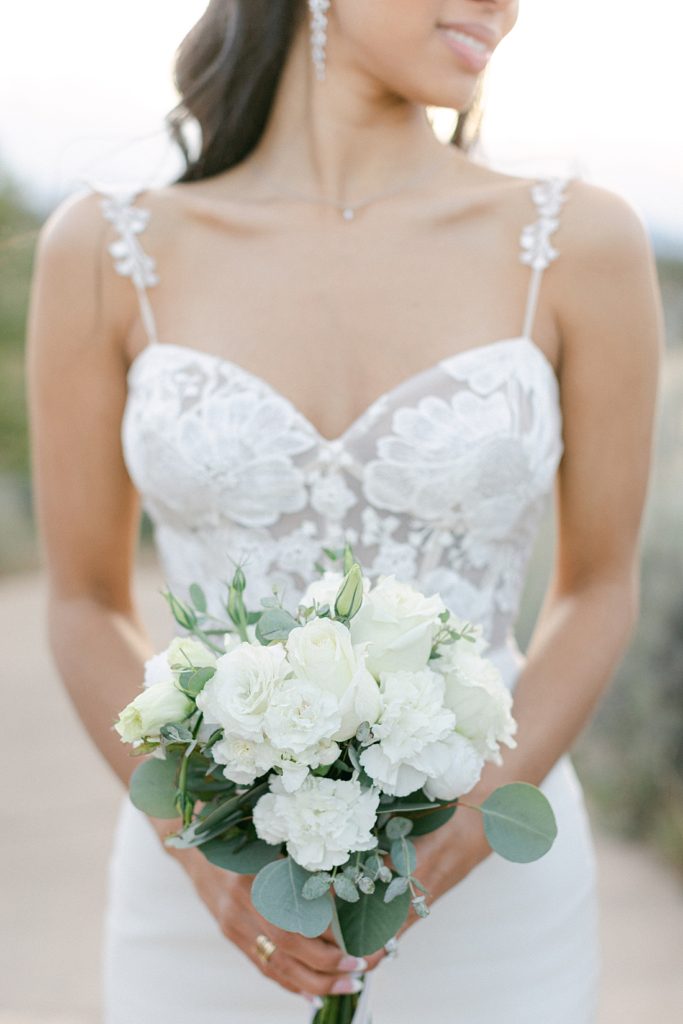 Chic and modern wedding - bride holding bouquet