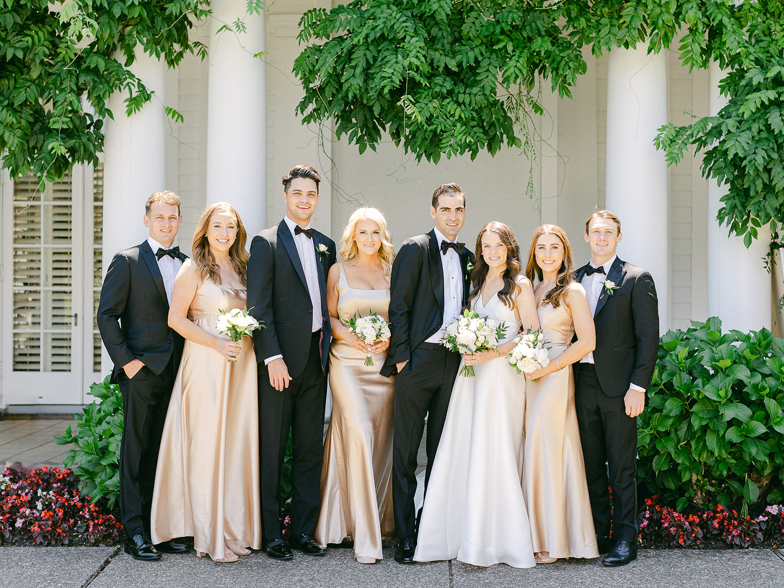 a group of people posing for a photo at Waverley country club wedding