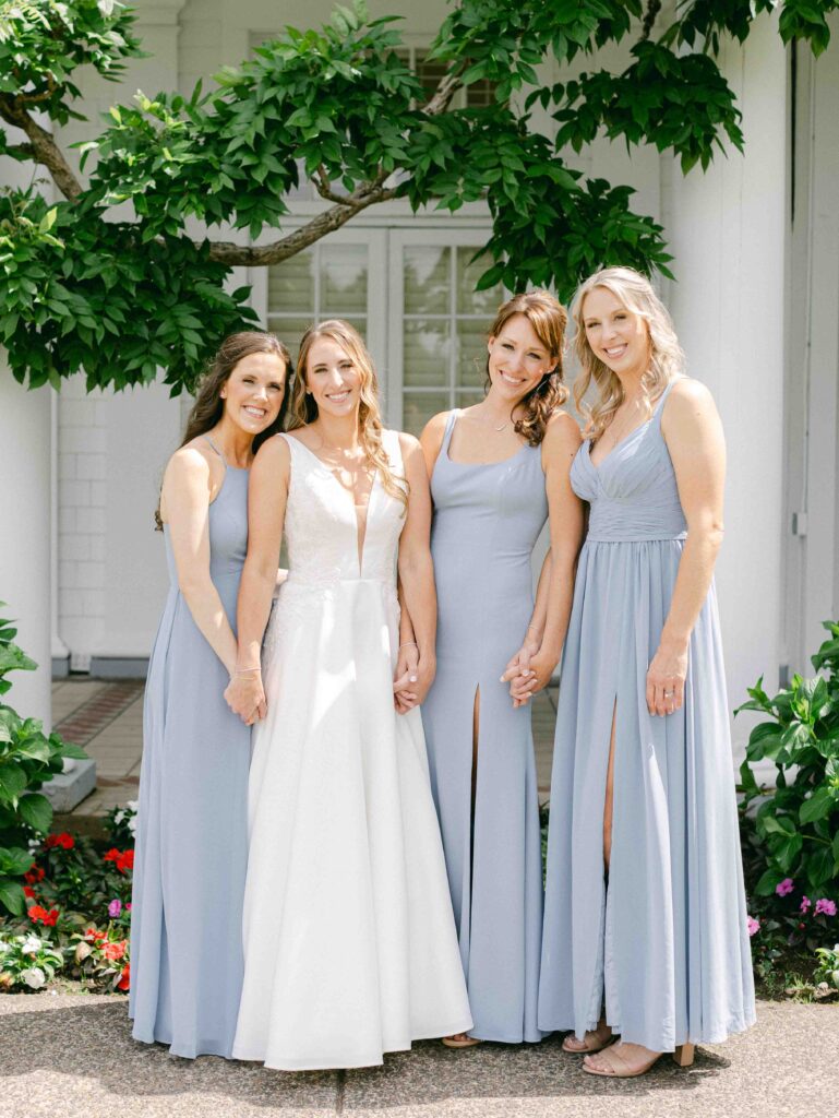 Waverley Country Club wedding with bridesmaids in blue dresses