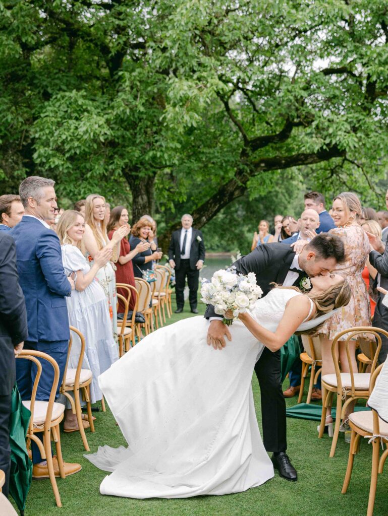  Waverley country club wedding ceremony with kissing couple