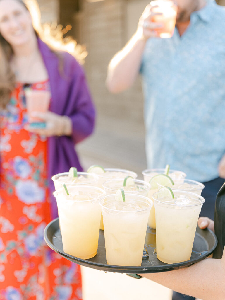 Unique ideas for welcome party decor and entertainment at a wedding weekend celebration
