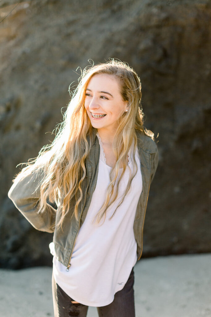 Oregon coast senior photos with neutral beach setting