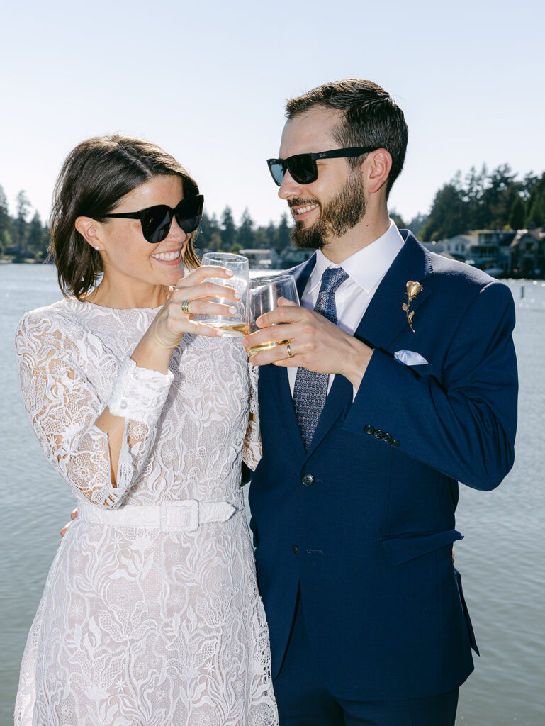 Bride and groom portraits along the lake in Lake Oswego Oregon