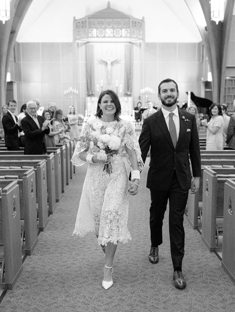 Bride and groom exiting church after wedding ceremony Lake Oswego