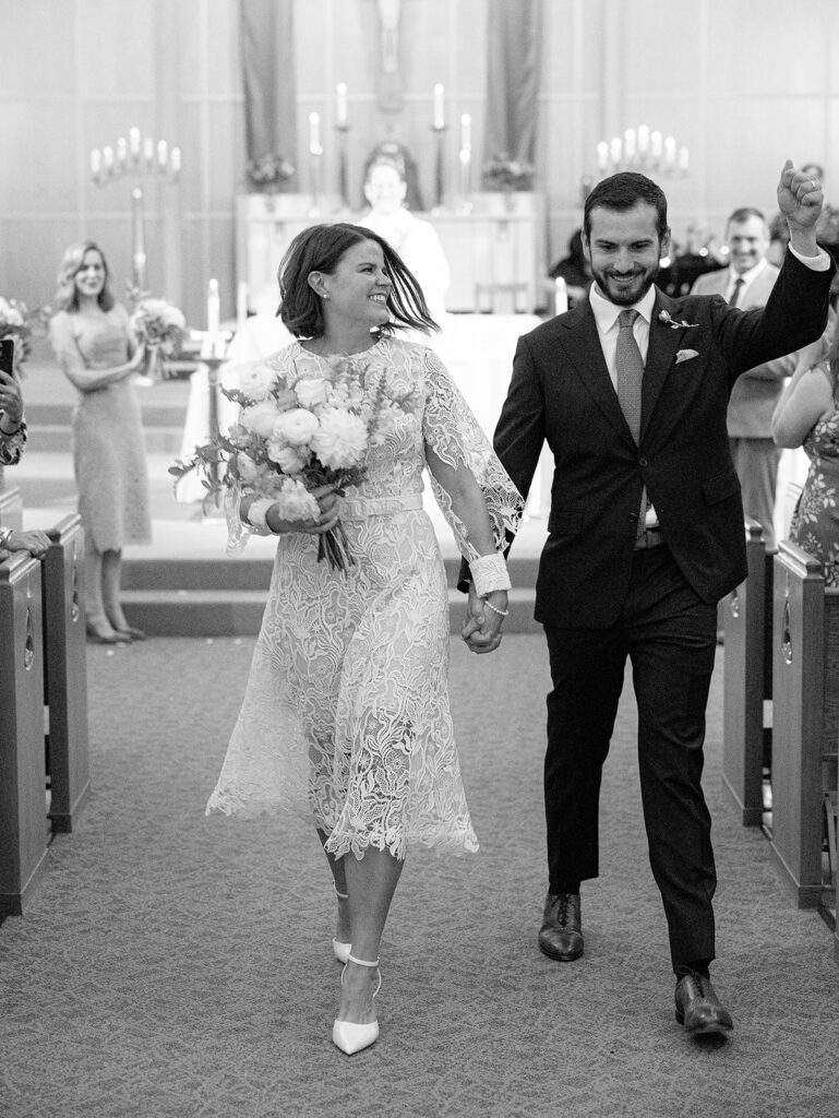 Bride and groom exiting church after wedding ceremony Lake Oswego