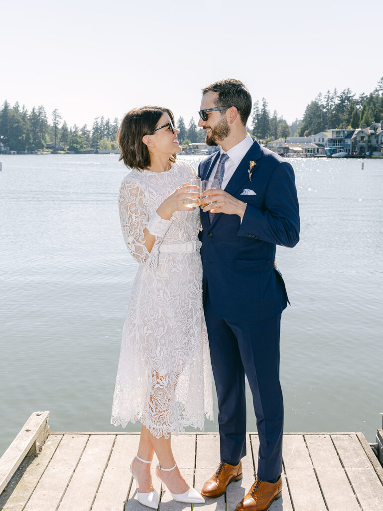 Bride and groom portraits along the lake in Lake Oswego Oregon