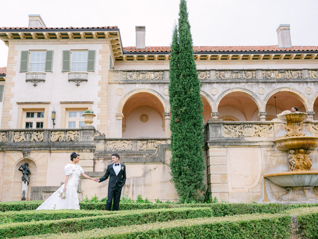 Luxury wedding couple portrait in the Philbrook Museum gardens