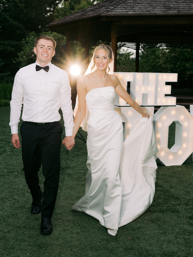 portrait of Owen and Emily in classic wedding attire at an oregon reception